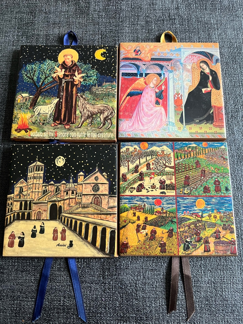 Four hand painted ceramic tiles